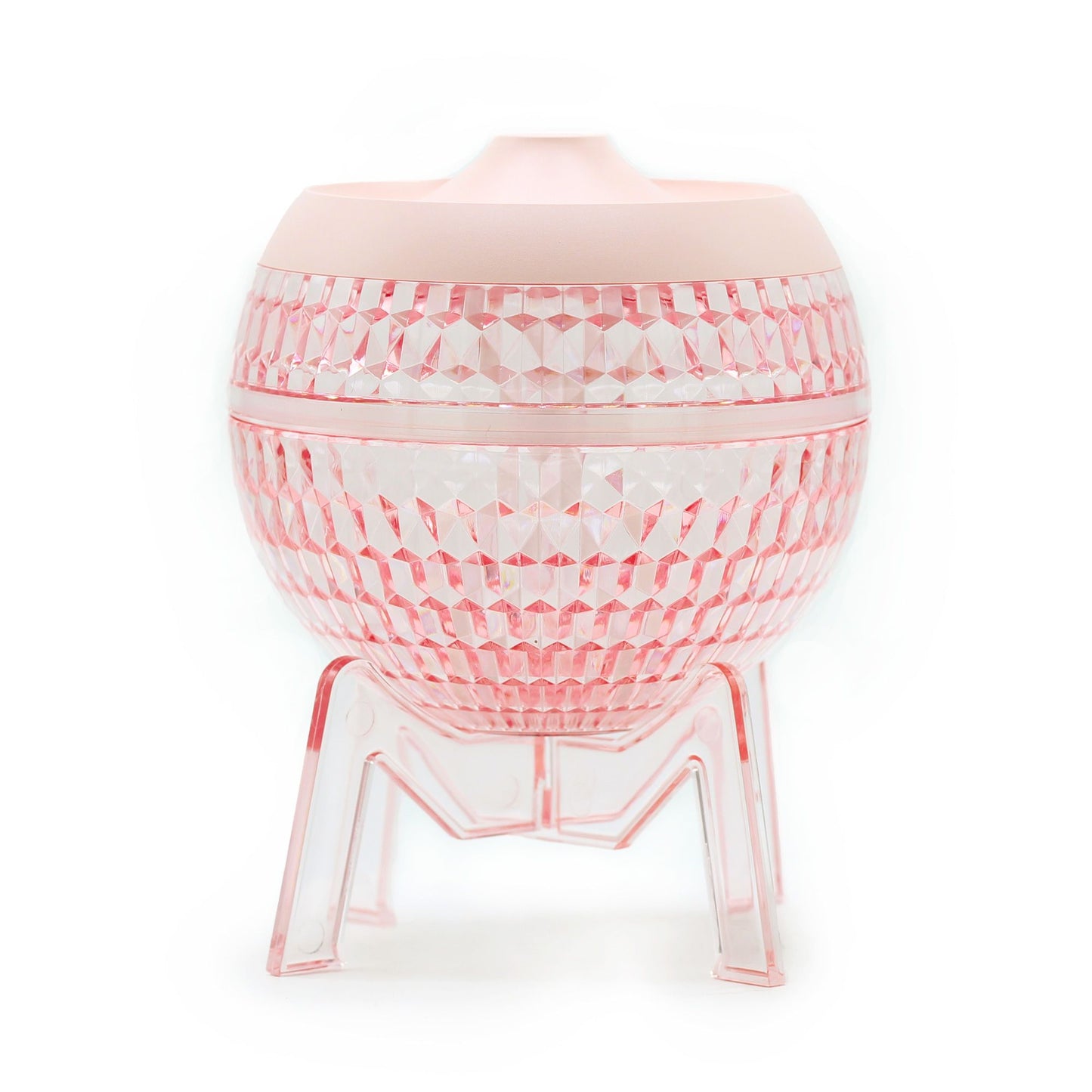 Sleek pink globe-shaped humidifier with a transparent base and soft colour-changing down light.
