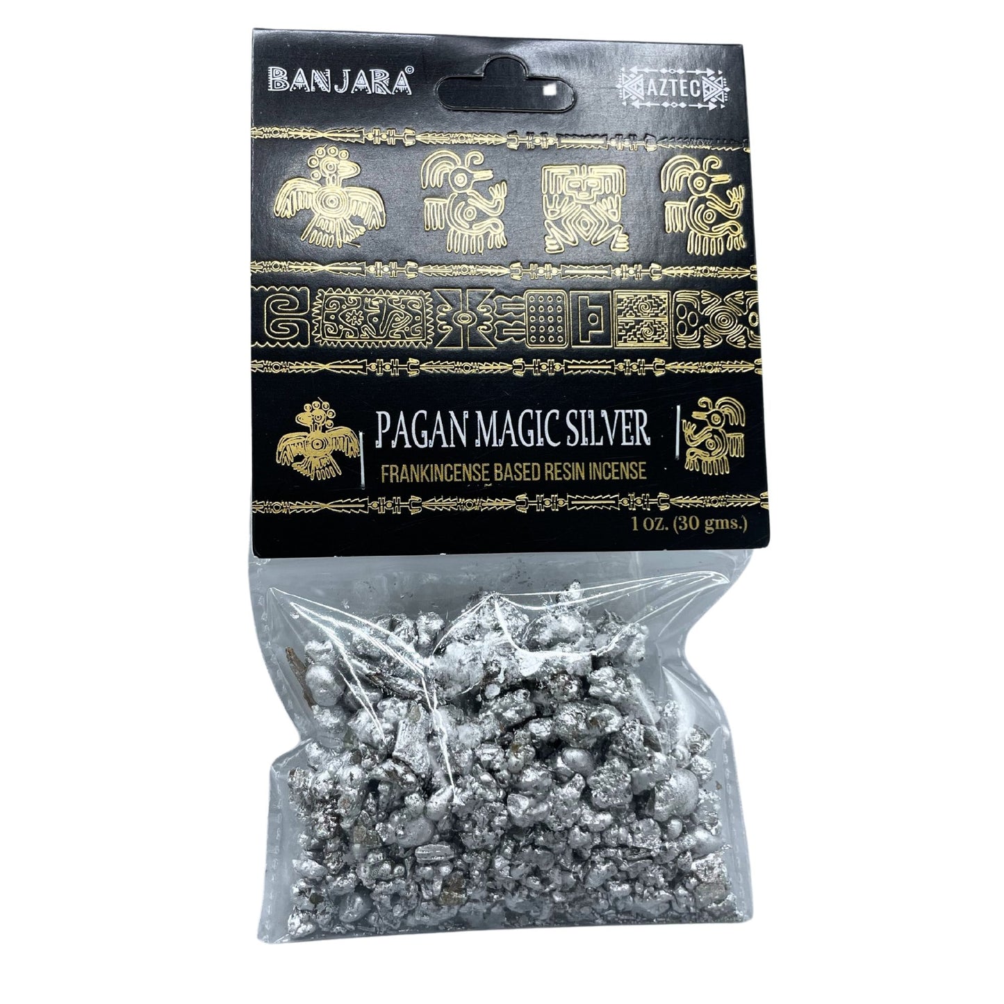 Close up of handcrafted aromatic tree resin pieces with a silver-toned mystical theme in a small bowl.