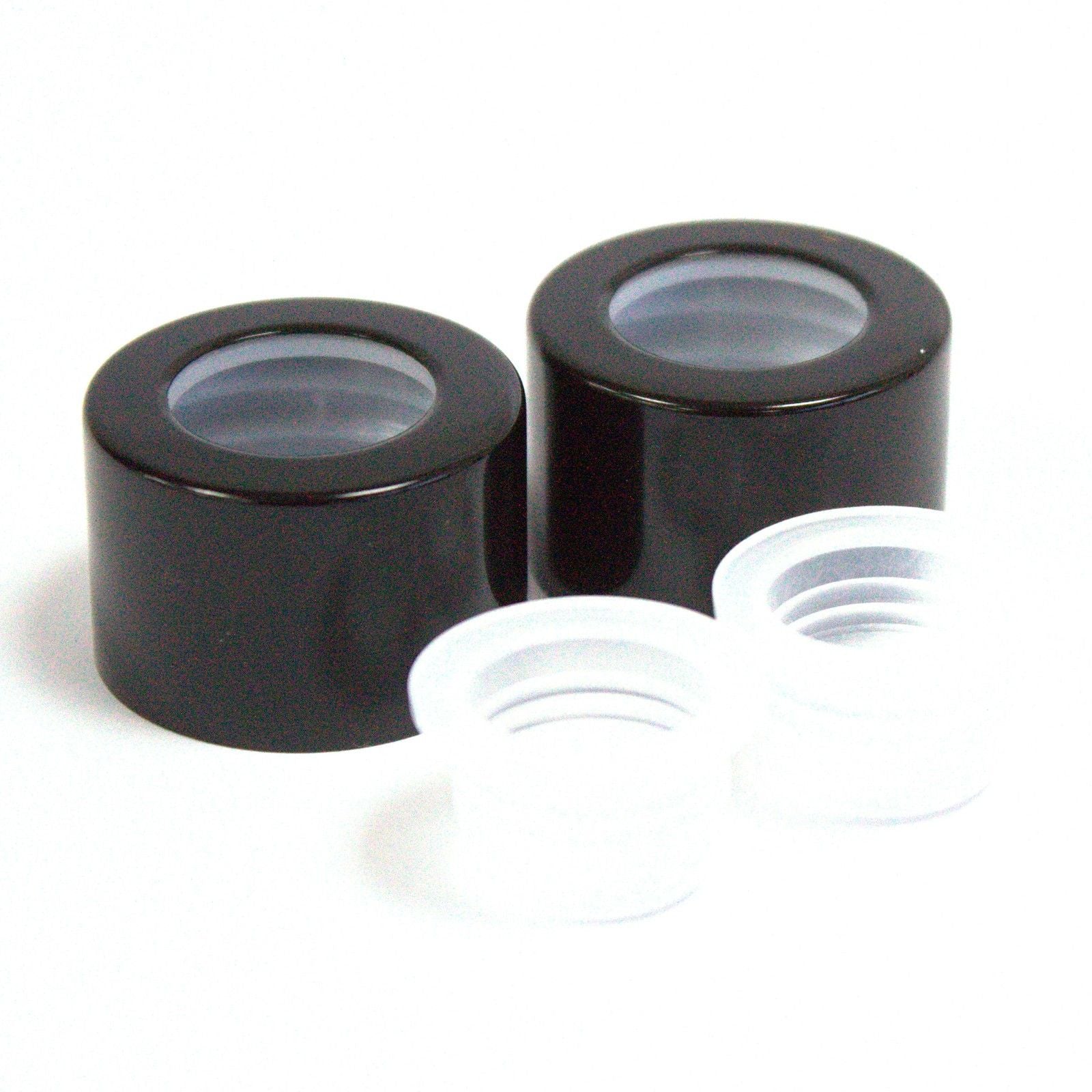 Sleek black replacement cap for reed diffuser bottles featuring a round design and matching travel plug insert.