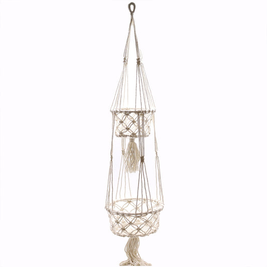 Handcrafted cream-coloured macrame double plant hanger featuring intricate knotted patterns and wooden rings for hanging.