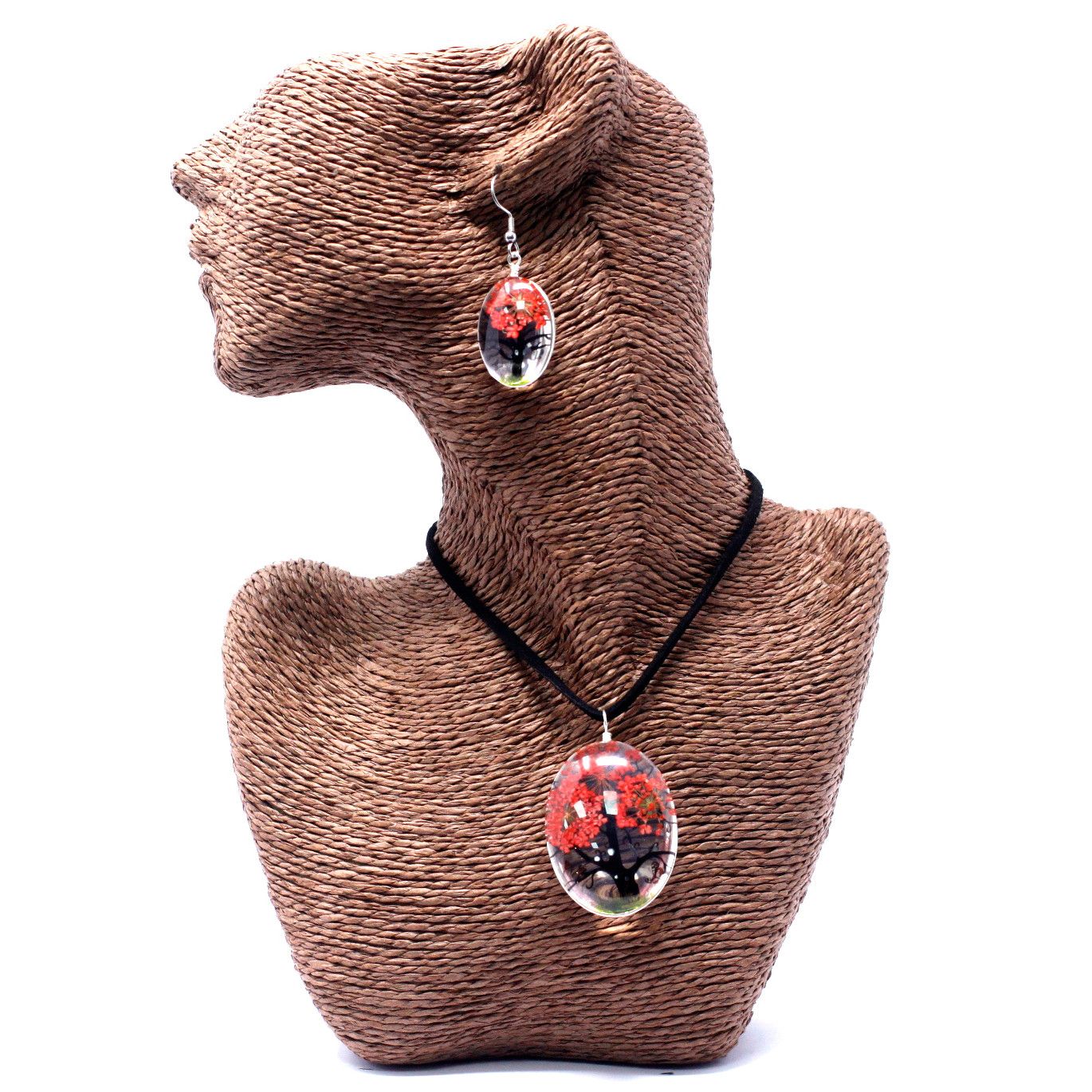 Elegant silver-toned necklace and earring set featuring a tree of life design with real pressed coral-coloured flowers.