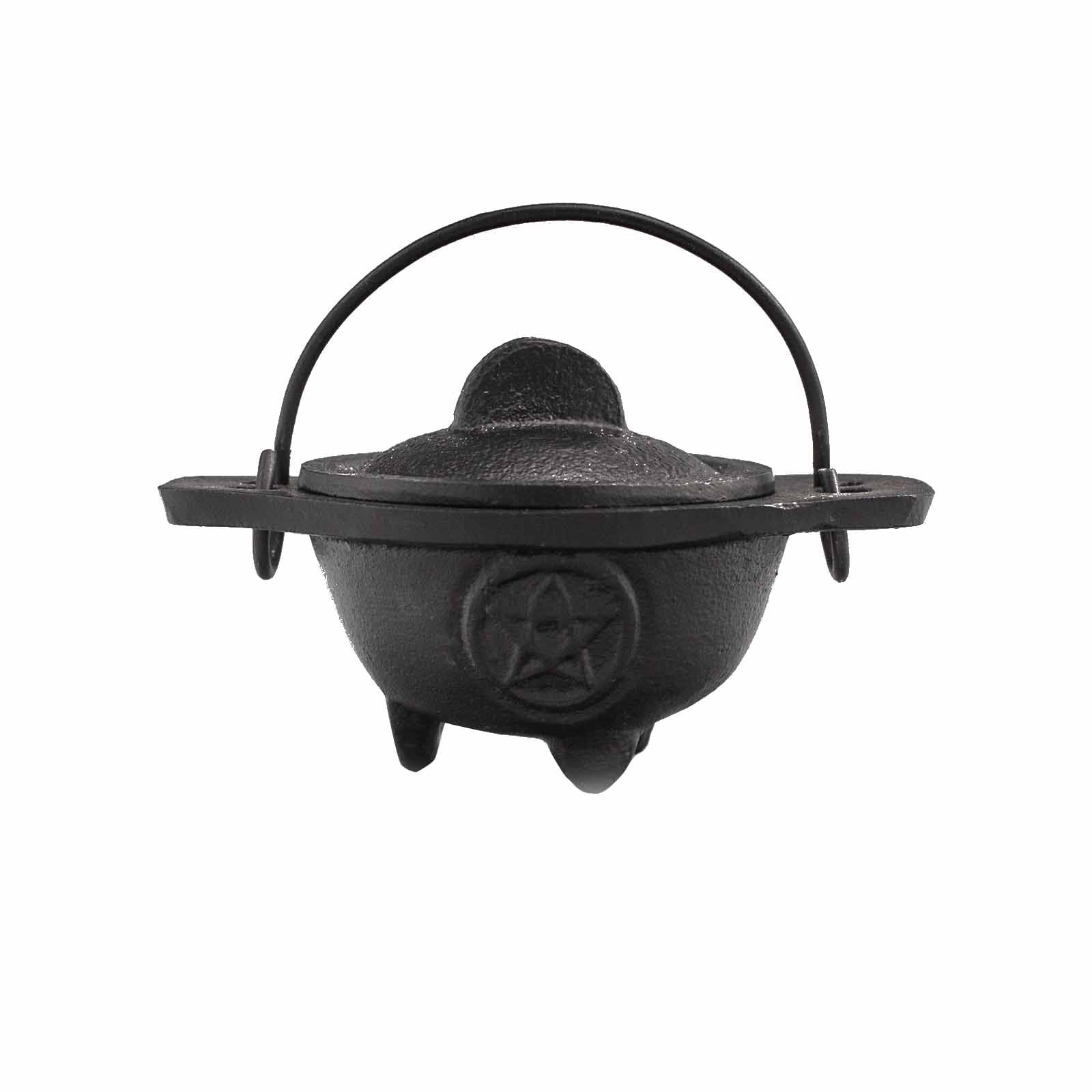 Small black cast iron cauldron featuring a raised pentagon symbol on three sturdy legs with a metal handle.