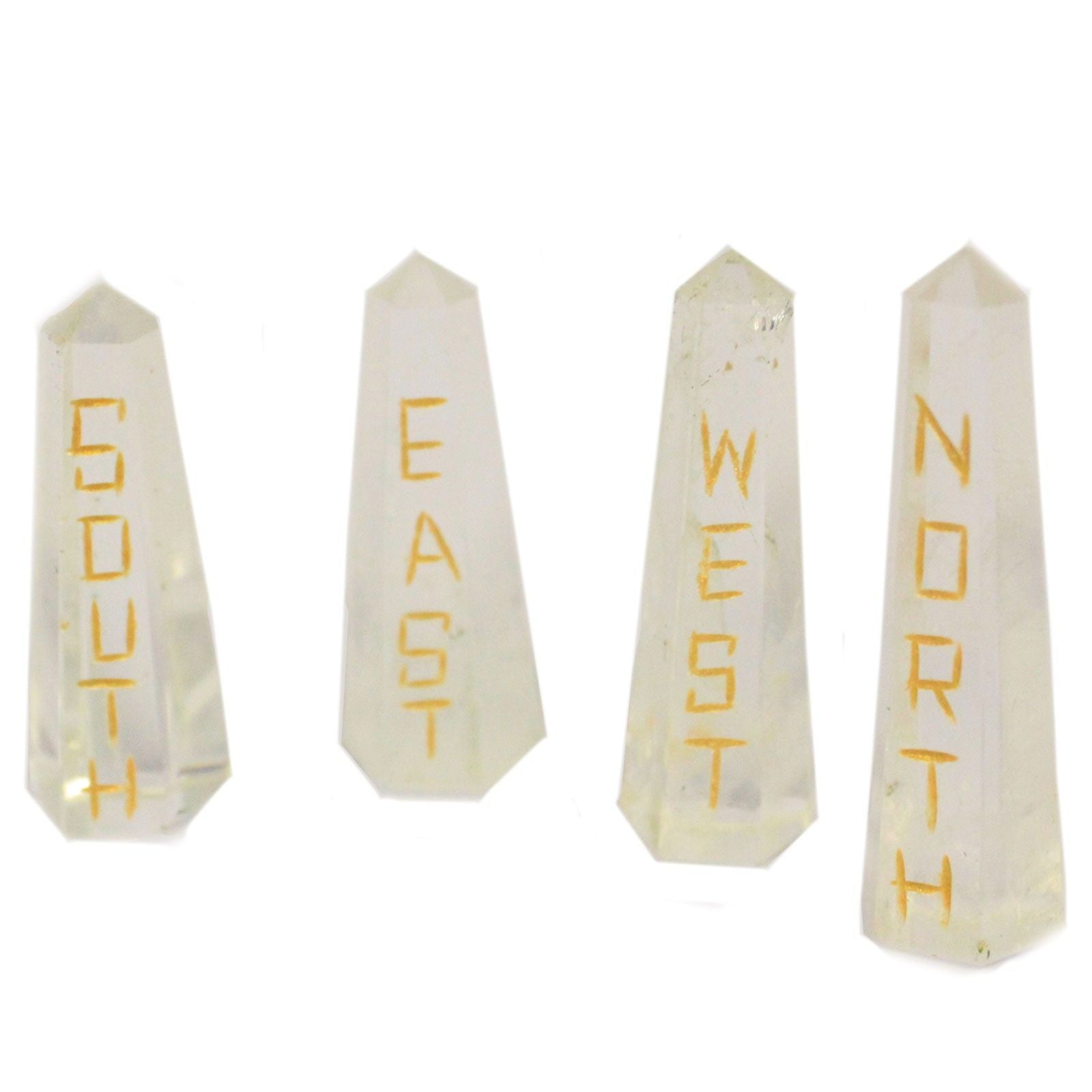 Four long natural quartz crystal points engraved with North, South, East, and West compass directions.