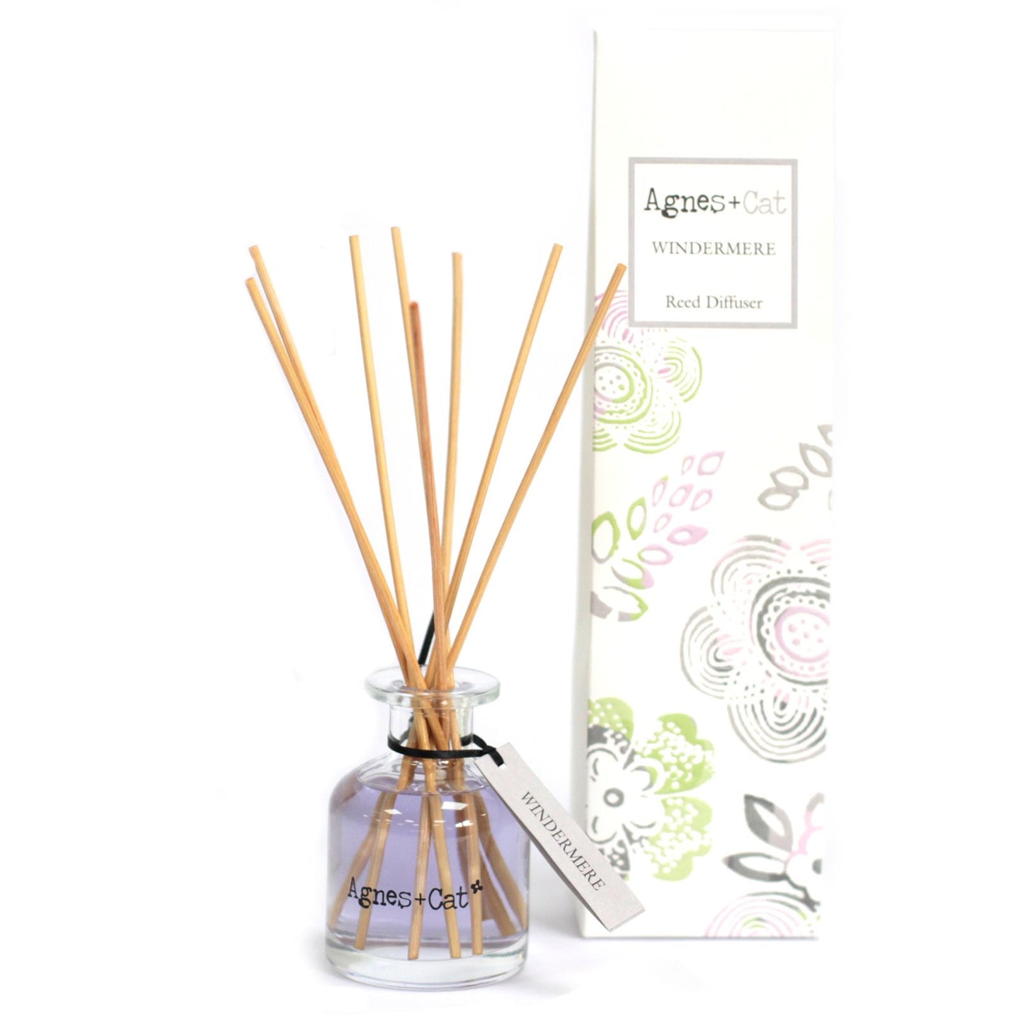 Elegant 140ml glass reed diffuser with natural rattan sticks in a decorative embossed gift box.