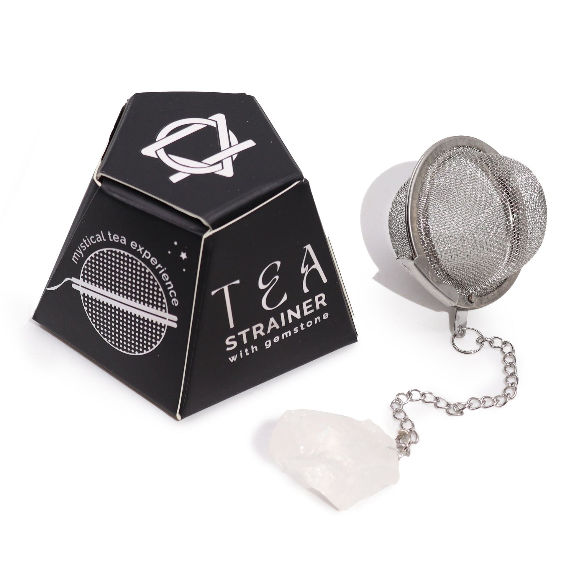 Stainless steel mesh tea strainer with a natural raw rock quartz crystal point attached to the handle.