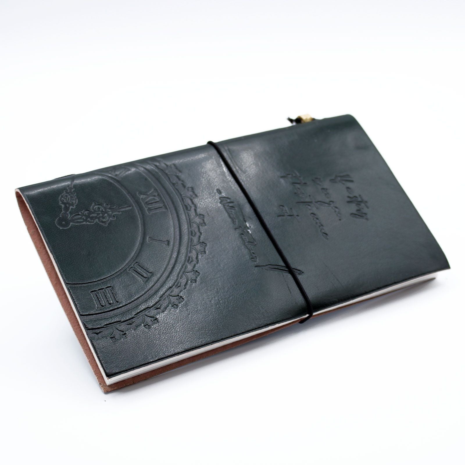 Slim green leather journal with an embossed quote and wrap-around band, featuring blank eco-friendly pages.
