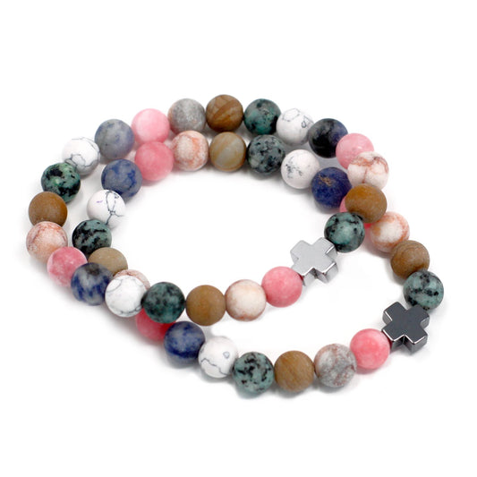 Two vibrant rainbow gemstone beaded bracelets with a comfortable stretch design shown together.