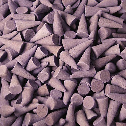 Large purple lavender scented incense cones piled together, showing their unique 25mm height and textured surface.