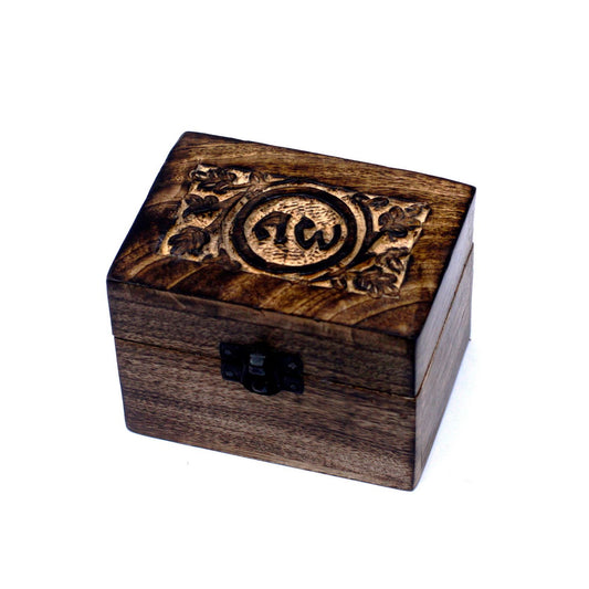 Hand-carved mango wood storage box with intricate floral designs, designed to hold six small essential oil bottles.