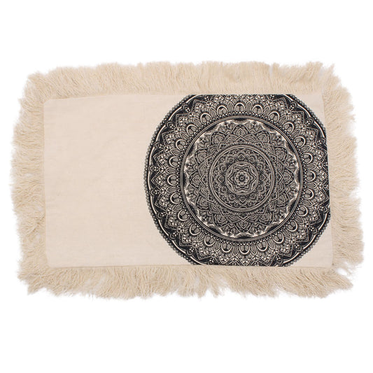 Rectangular black cushion featuring an intricate white traditional mandala design on a dark fabric background.
