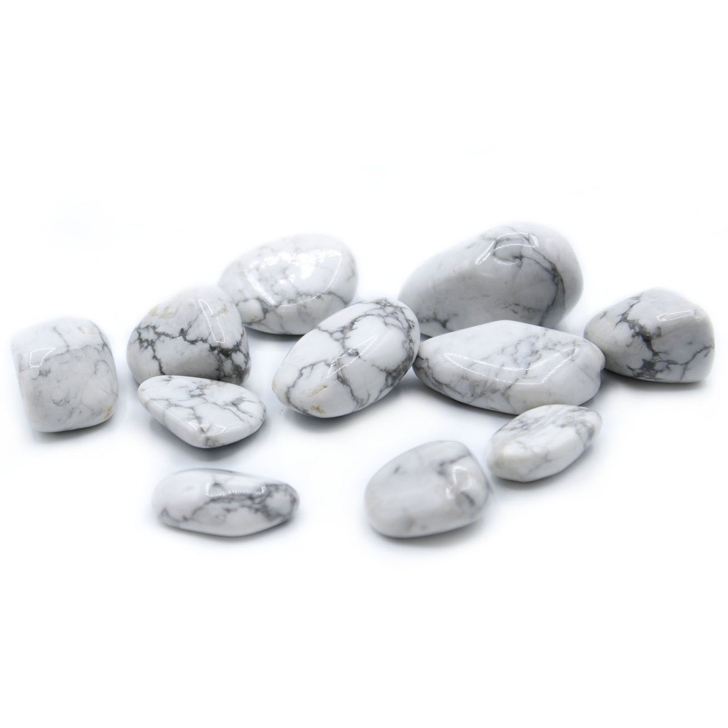 Large polished white howlite tumble stone with distinctive grey veining on a plain background.
