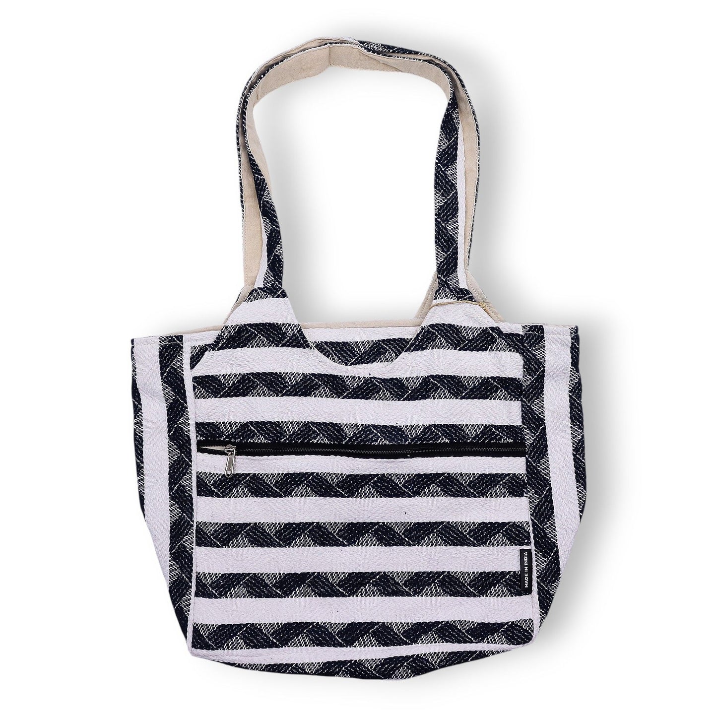 Navy and white patterned jacquard fabric tote bag with a soft handmade texture and woven handles.