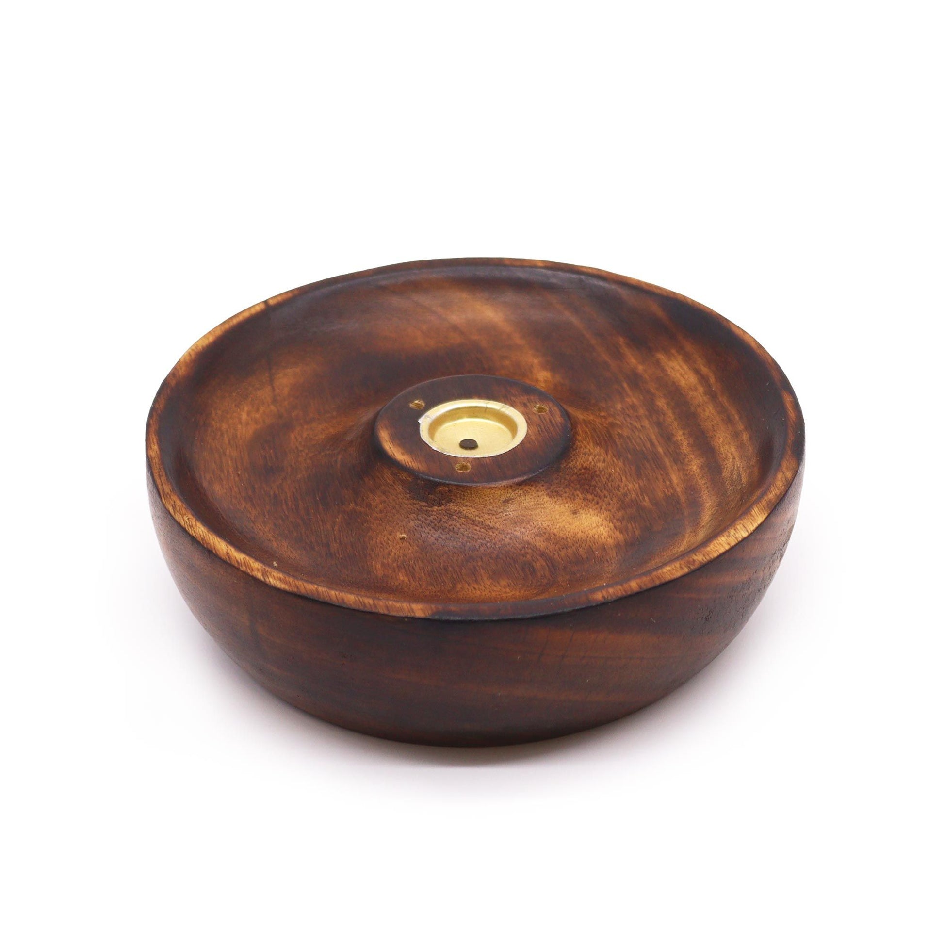 Minimalist circular wooden incense burner disc with a central hole for sticks and a flat surface for cones.