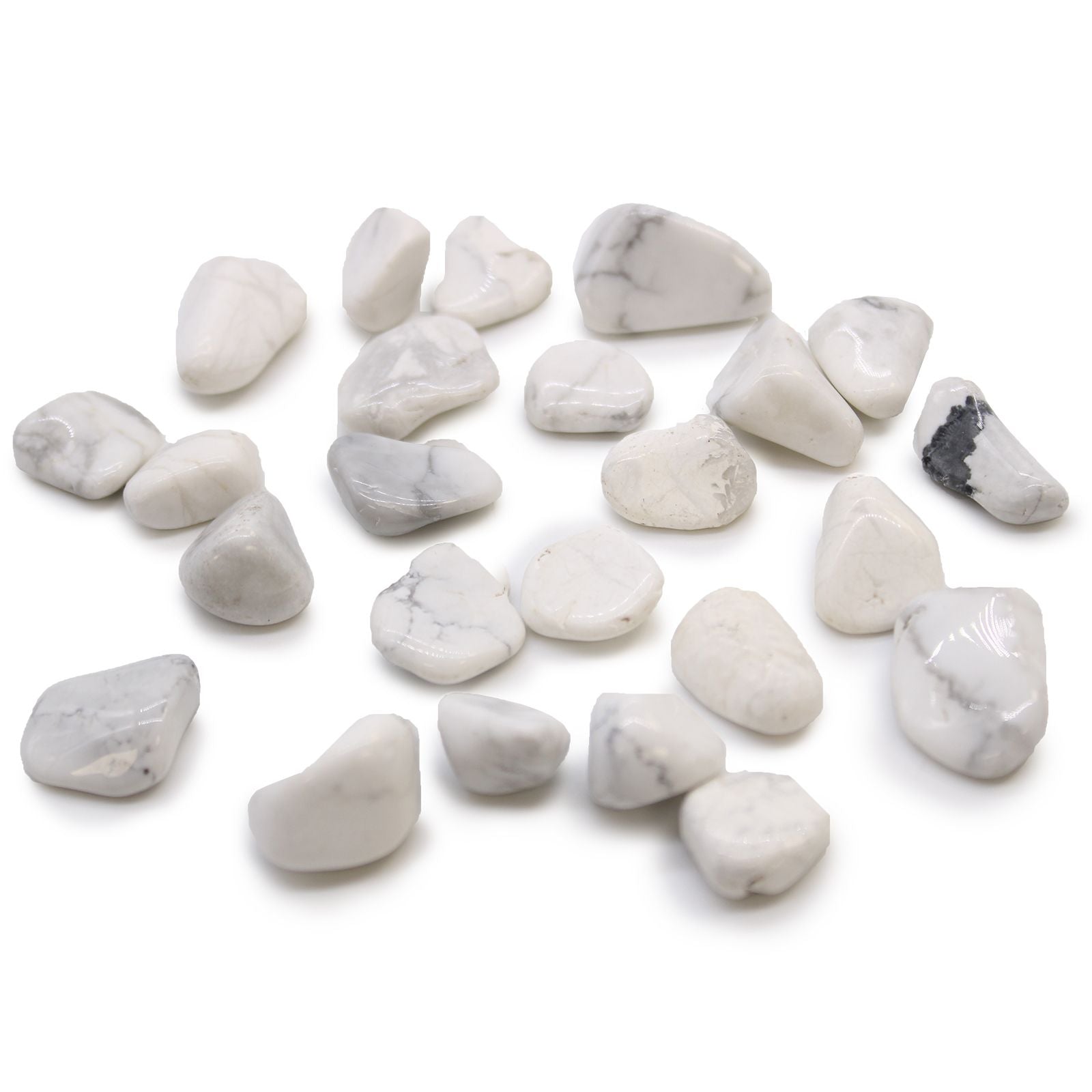 Smooth, milky white tumbled howlite stones with natural grey and dark brown marble-like inclusions.