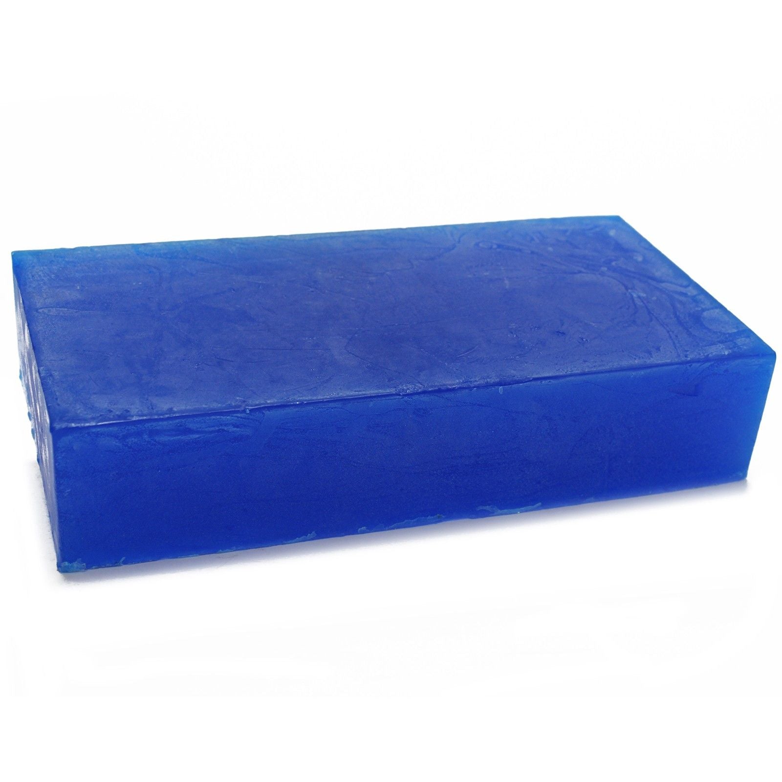 Large rectangular handmade lavender essential oil soap loaf with dried lavender botanicals on top.