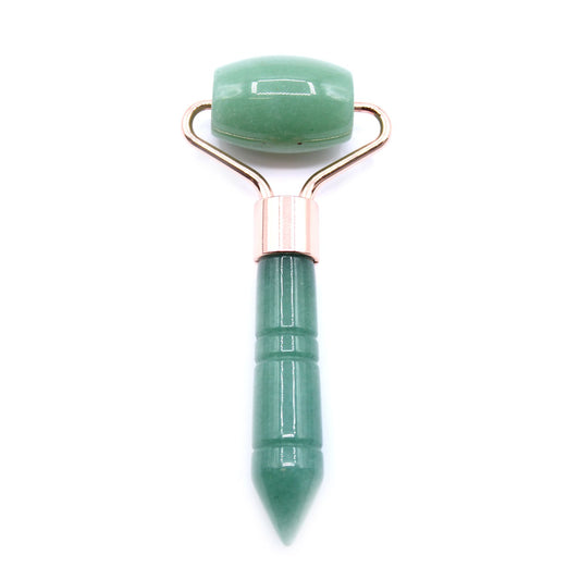 Miniature green jade gemstone facial roller with a smooth polished finish and silver-toned metal frame.