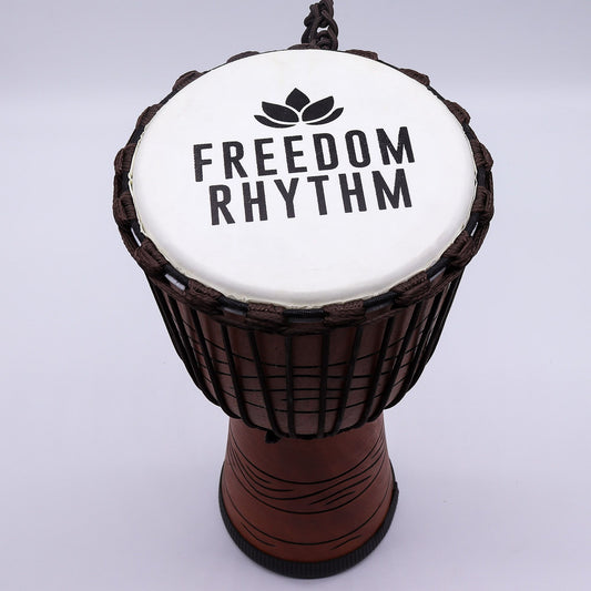 Handcrafted 50cm tall professional djembe drum with a 22cm goat skin head and decorative rope tuning.
