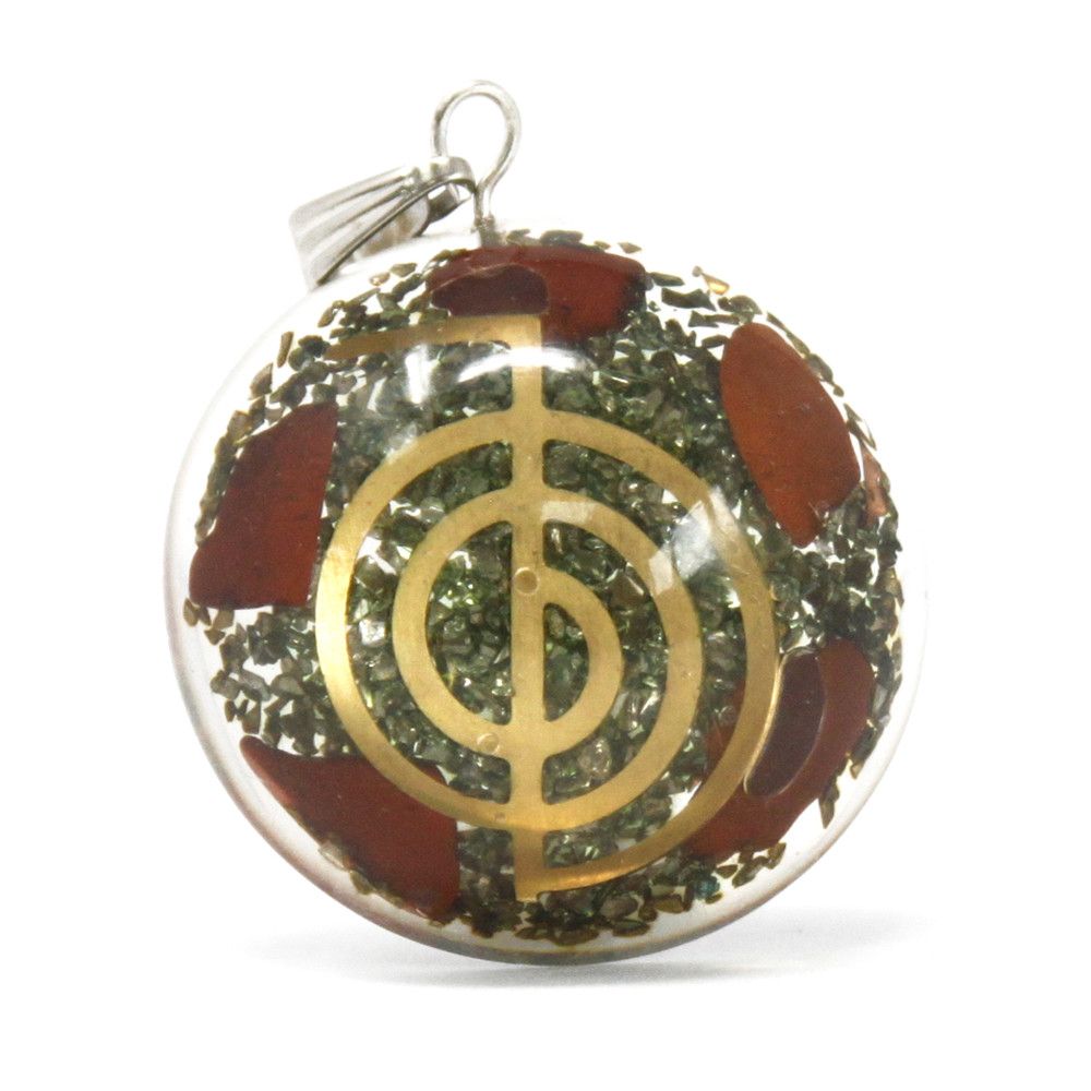 Dome shaped orgonite pendant featuring layered gemstone chips, copper filings, and a central symbolic esoteric object.