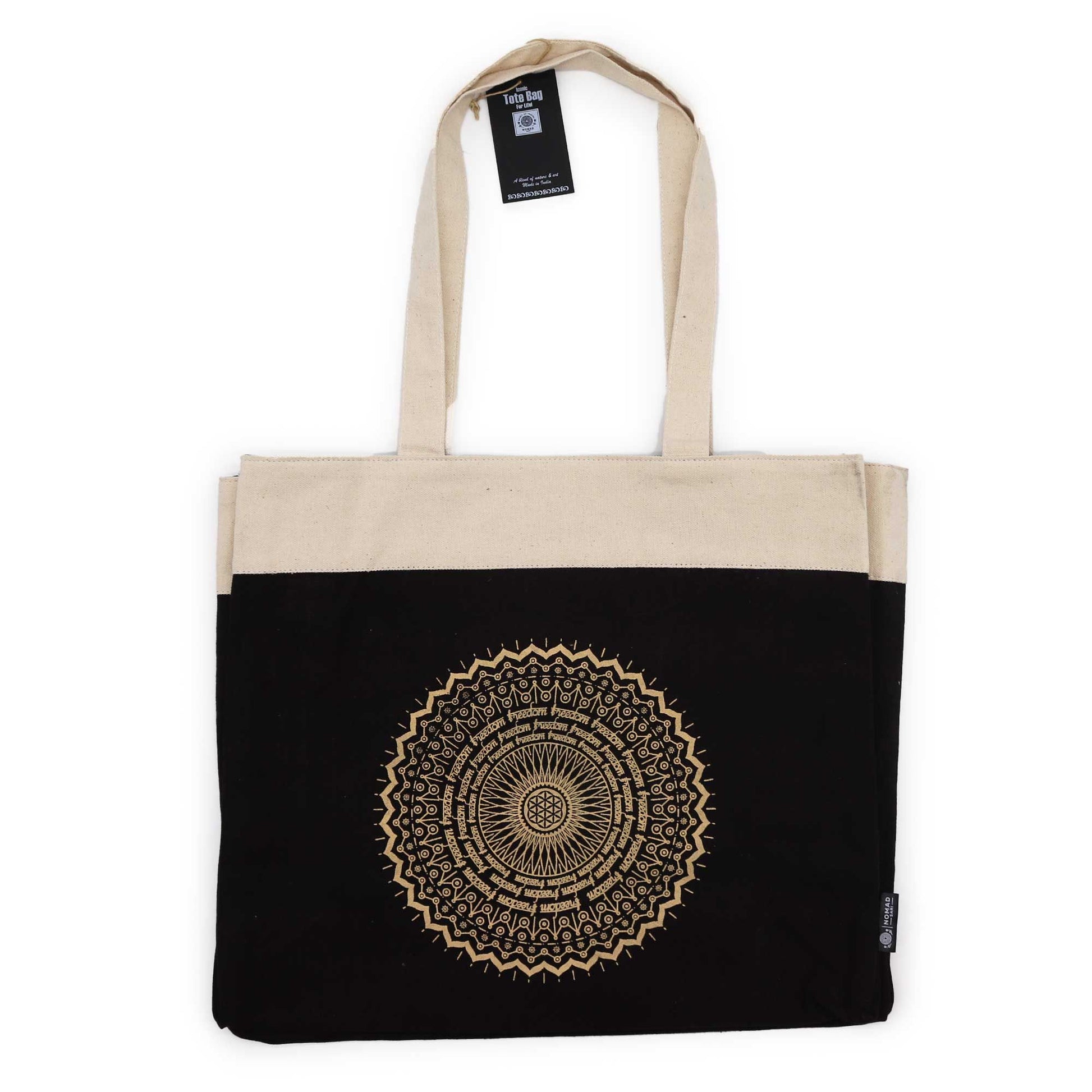 Oversized stonewashed blue cotton tote bag featuring a large gold mandala wheel print in a bohemian style.
