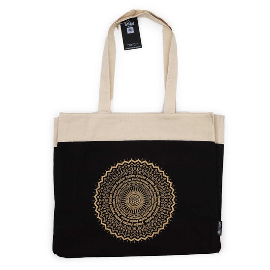 Oversized stonewashed blue cotton tote bag featuring a large gold mandala wheel print in a bohemian style.