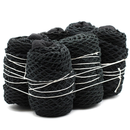 Close-up of a durable black cotton mesh bag with a woven texture and lightweight design.
