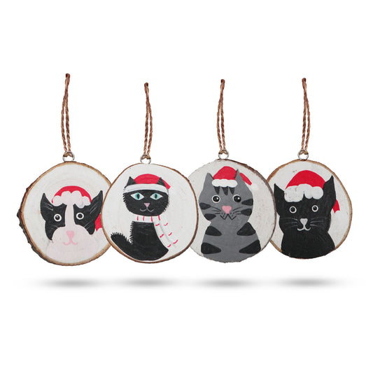 Set of four rustic wooden log slices featuring hand-painted festive cats with Christmas hats and seasonal designs.