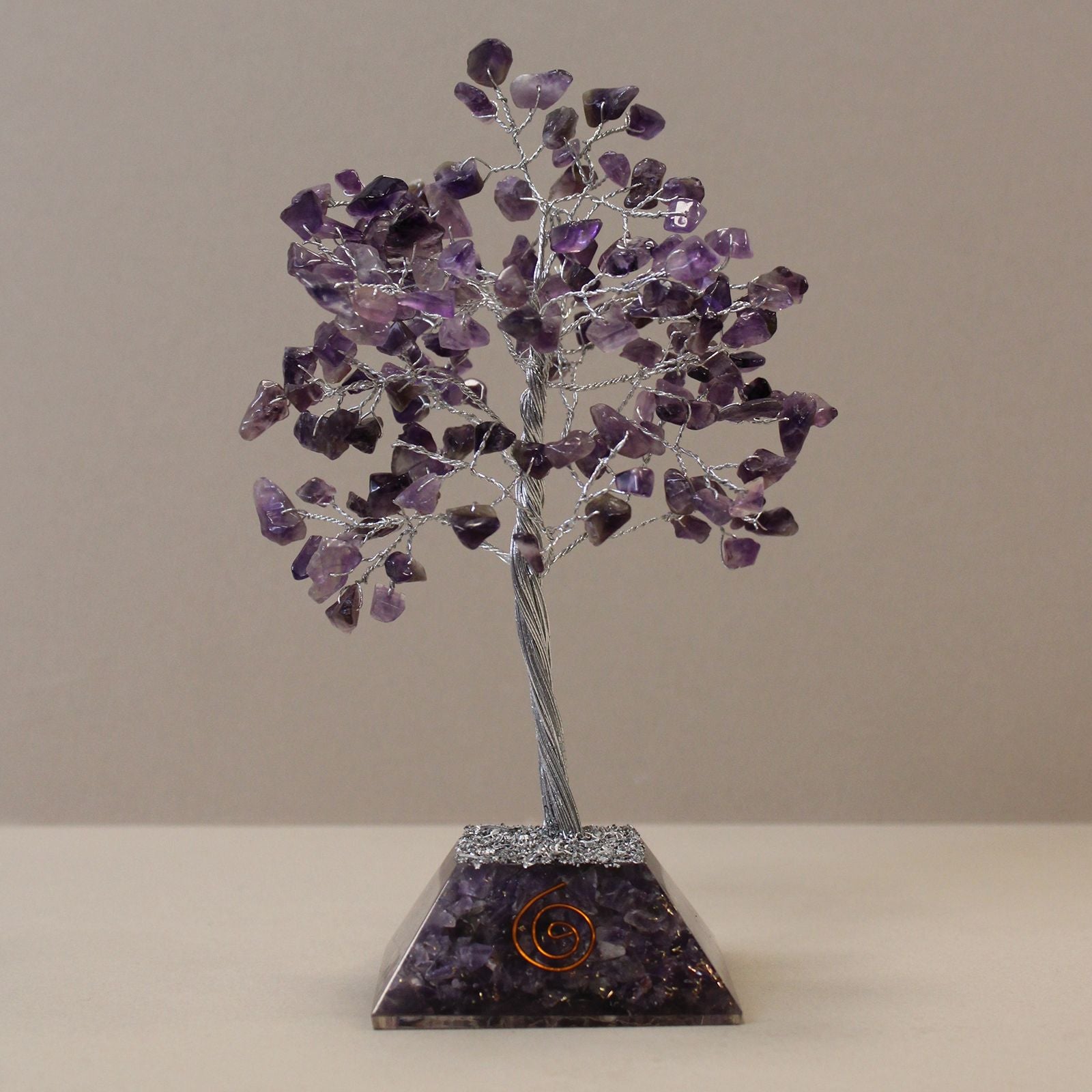 Handcrafted Amethyst gemstone tree with 160 tumbled stones on a pyramid-shaped orgonite base.
