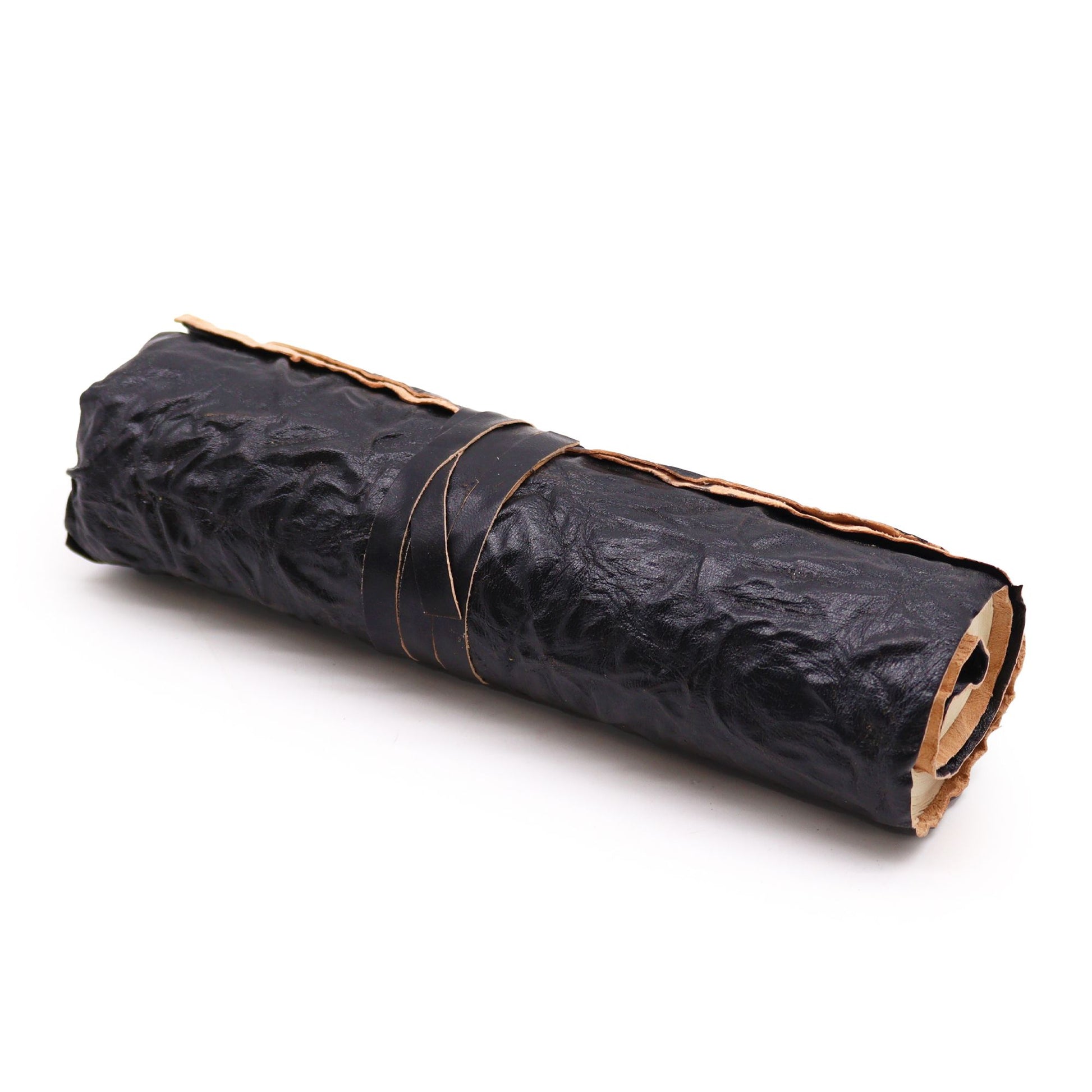 Sophisticated black rolled leather notebook with a secure wrap-around tie closure on a neutral background.