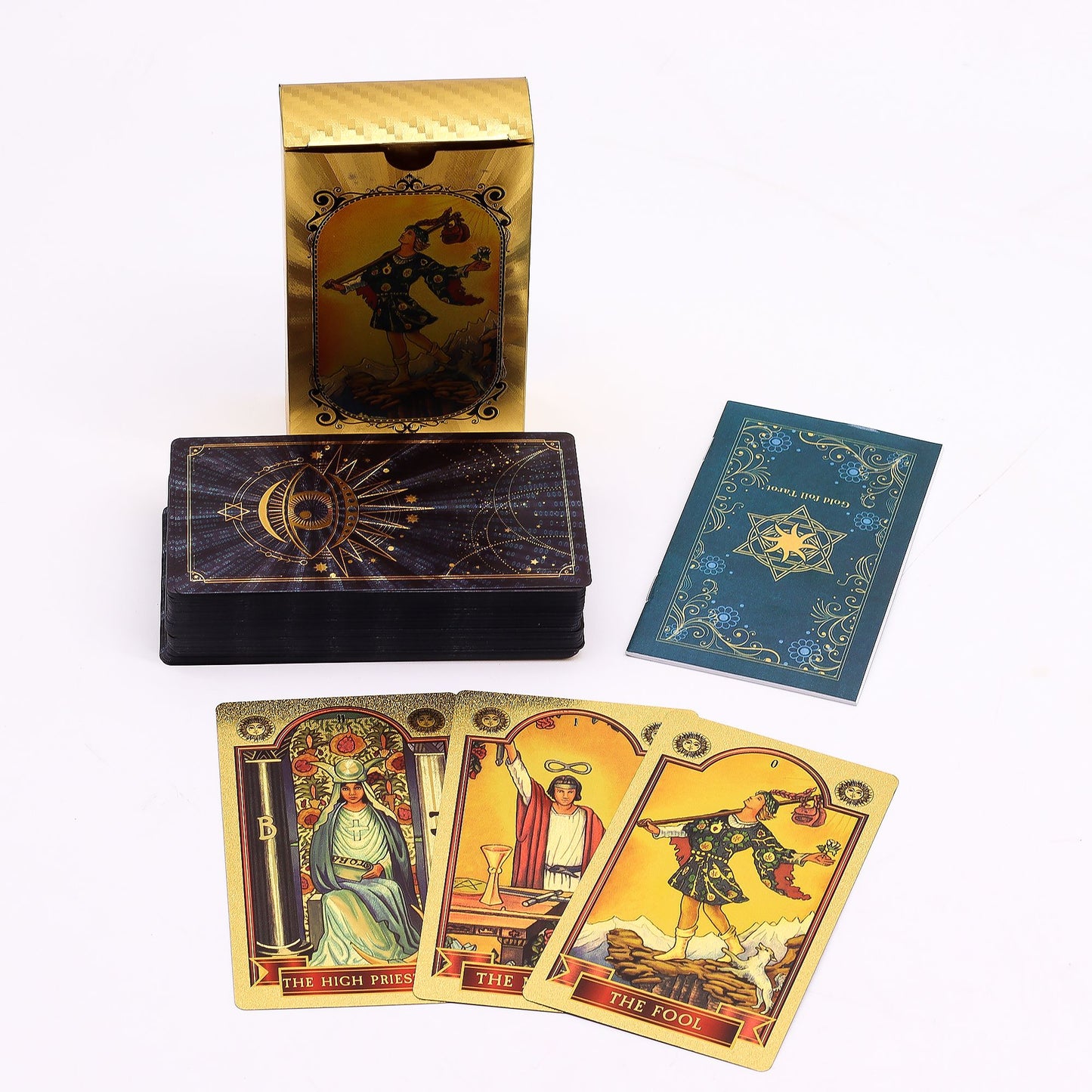 Luxurious blue tarot cards with intricate gold foil All Seeing Eye illustrations and a matching guidebook.