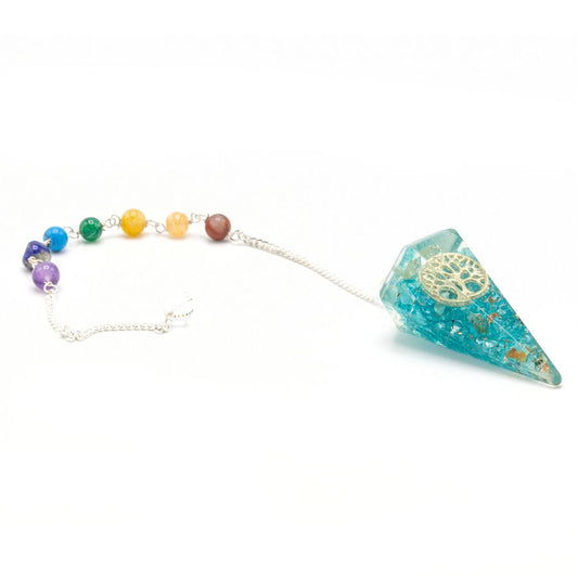 Handcrafted orgonite chakra pendulum featuring a metallic Tree of Life symbol and vibrant multi-coloured layers.