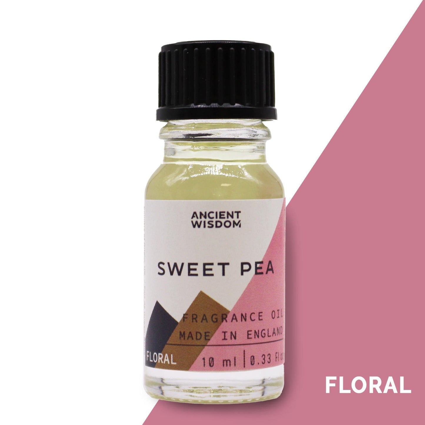 Small amber glass bottle of sweet pea fragrance oil with a white label and black dropper cap.