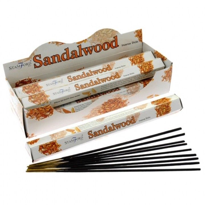Hexagonal pack of premium sandalwood incense sticks showing traditional brown sticks for home fragrance.