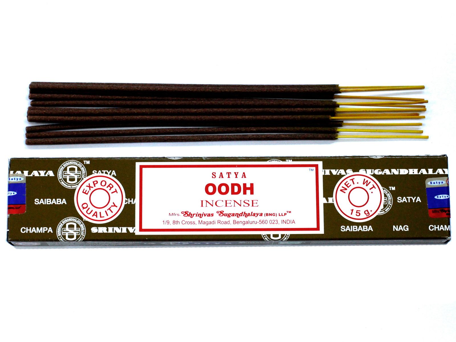 Hand-rolled Oodh incense sticks with a rich woody aroma on a simple background.