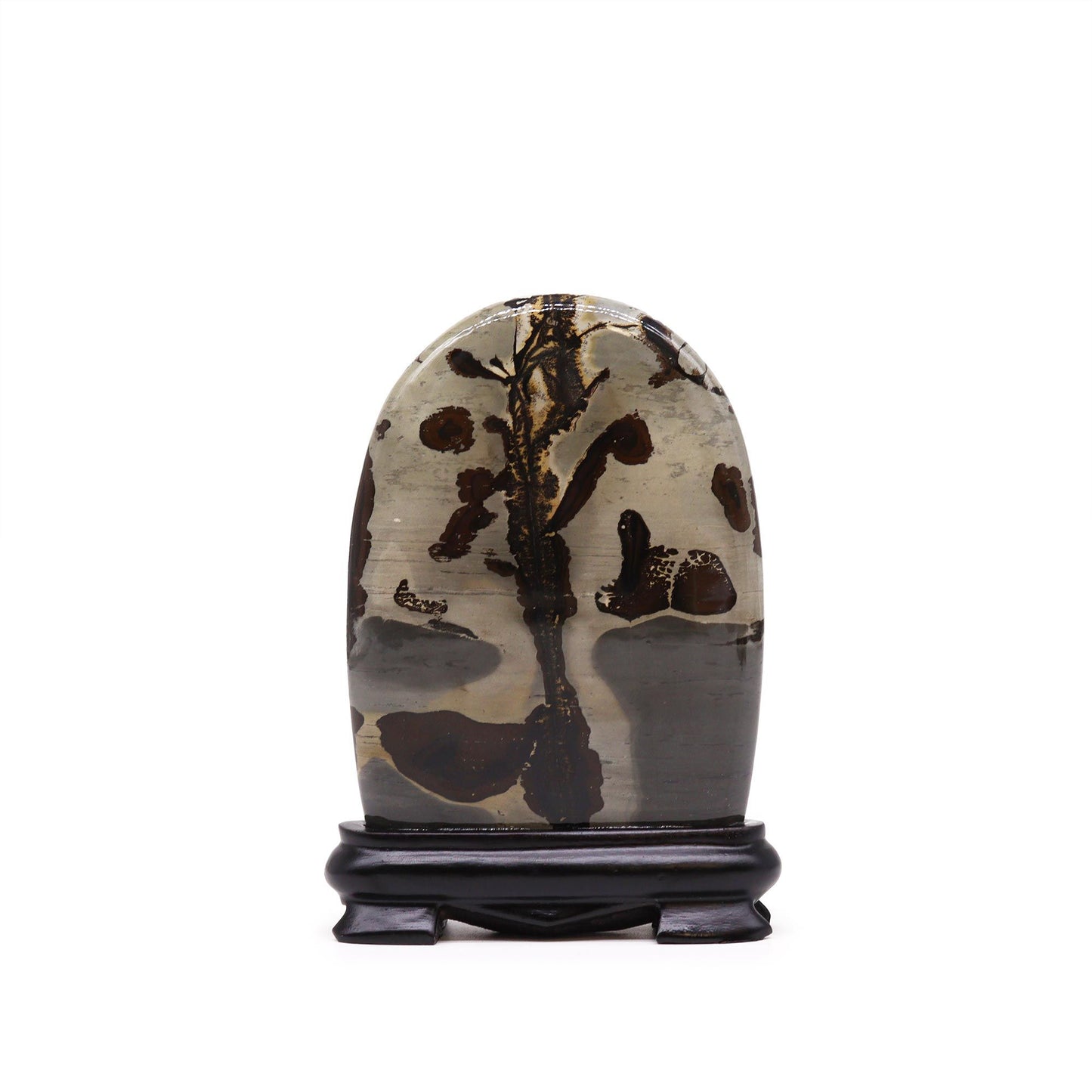 Arch-shaped limestone slab featuring natural black dendrite patterns resembling delicate tree branches or landscapes.