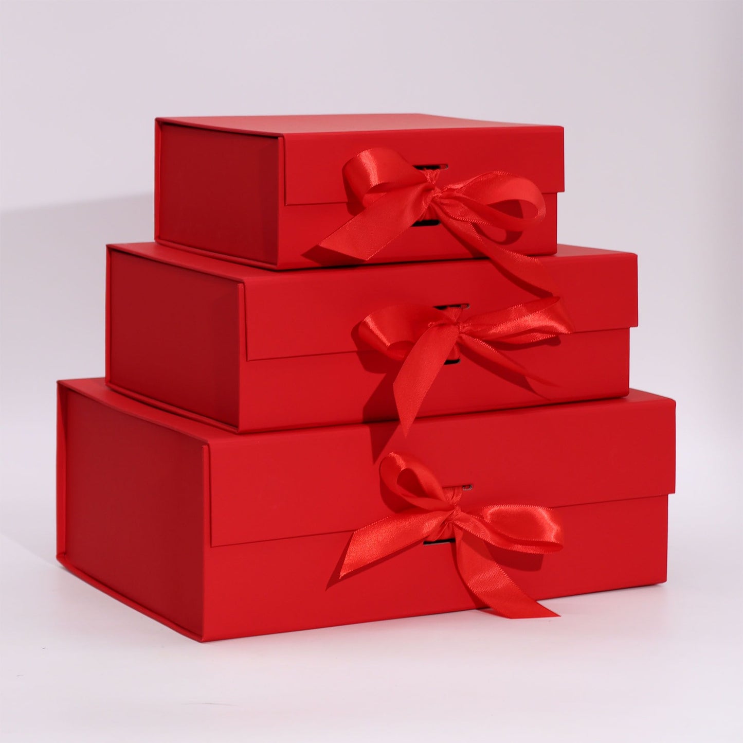 Sturdy medium square red flat pack gift box with a smooth finish, shown assembled.