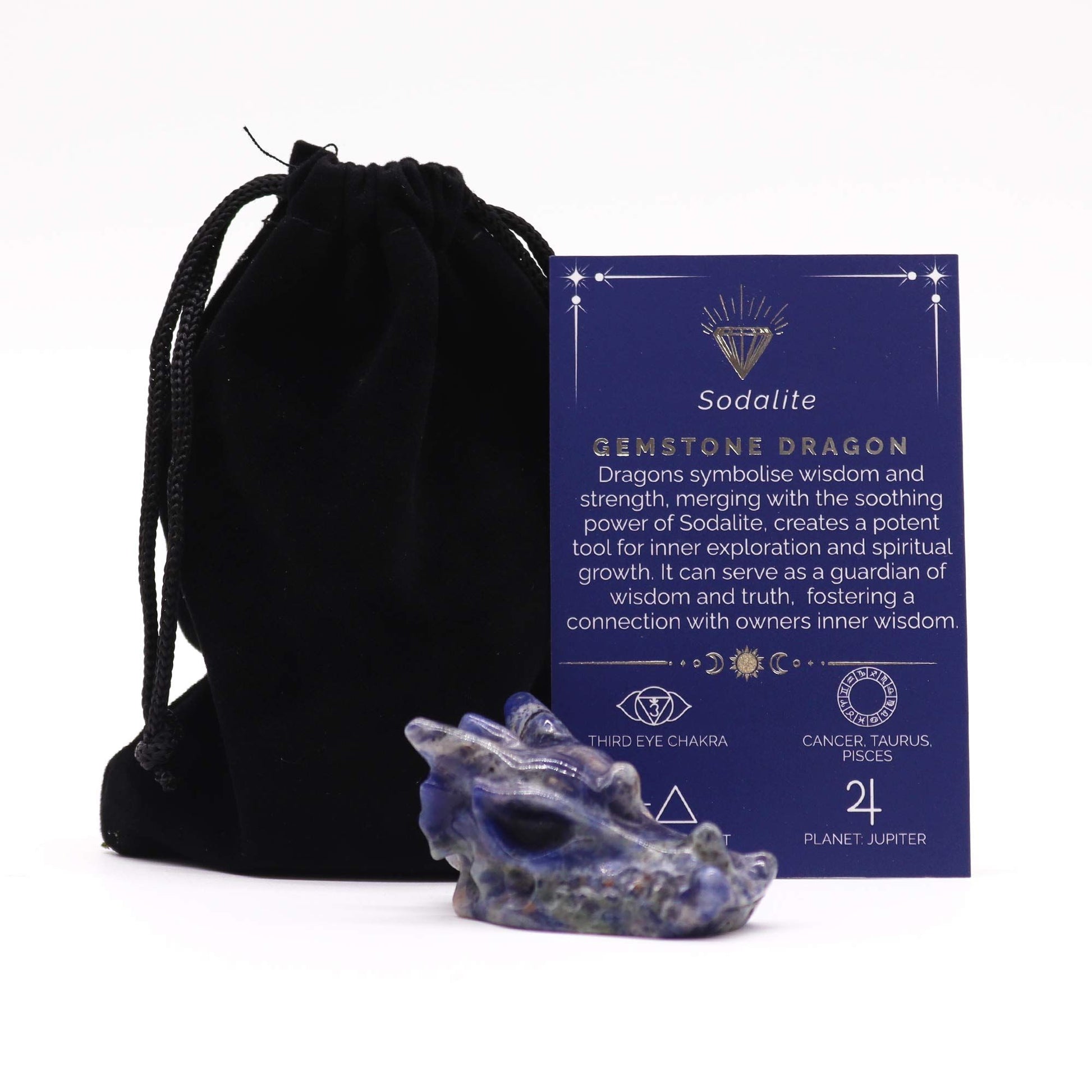 Detailed small hand-carved blue and white sodalite gemstone dragon head figurine.