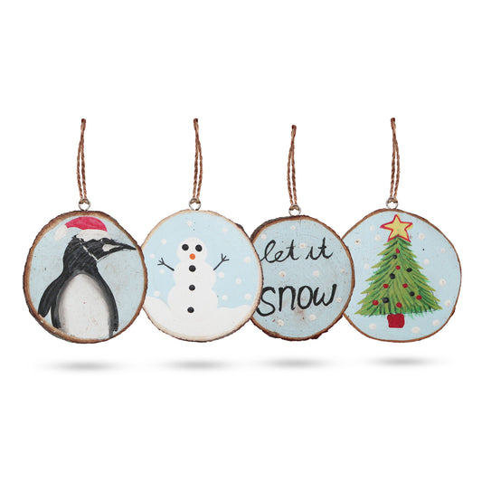 Set of four rustic hand-painted wooden log slices featuring festive Let it Snow winter designs for Christmas decorating.
