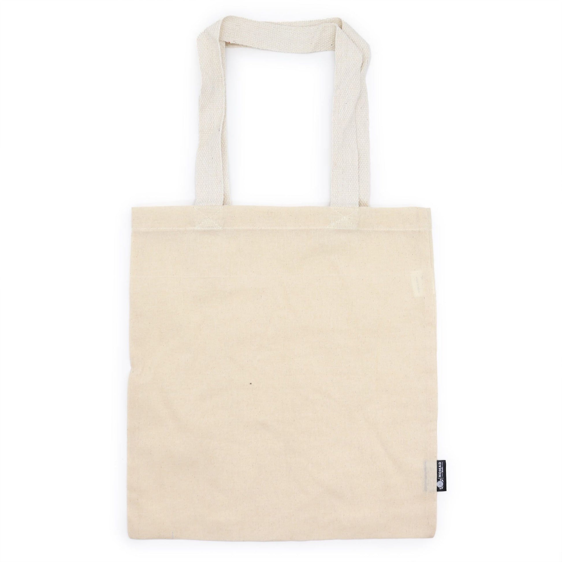 Simple and sustainable natural cream-coloured cotton tote bag with long handles shown against a neutral background.