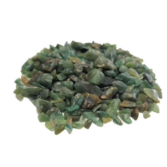 A large pile of small, polished green aventurine gemstone chips showing various shades of natural green.