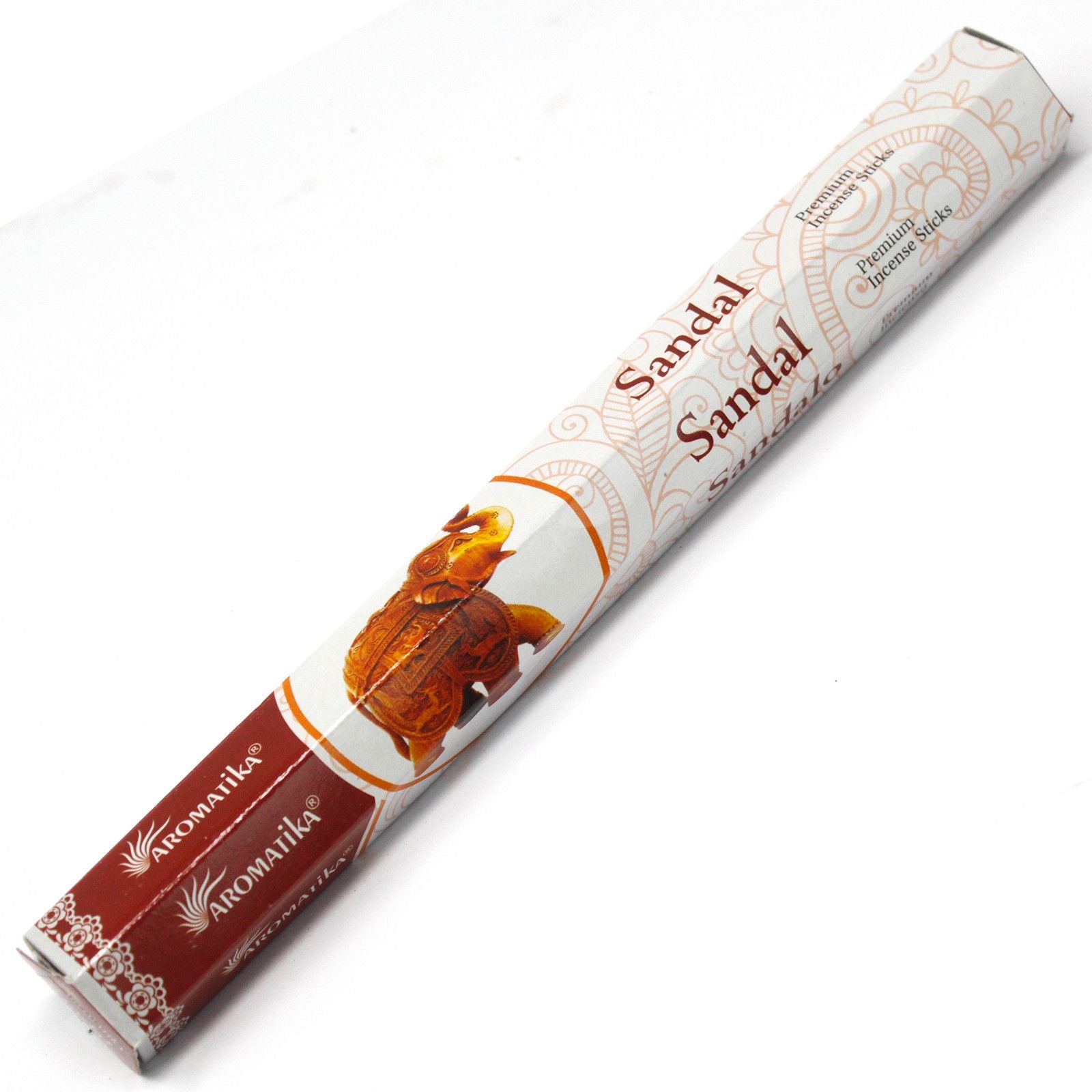 Hand-rolled natural sandalwood masala incense sticks with a traditional wooden powder finish.