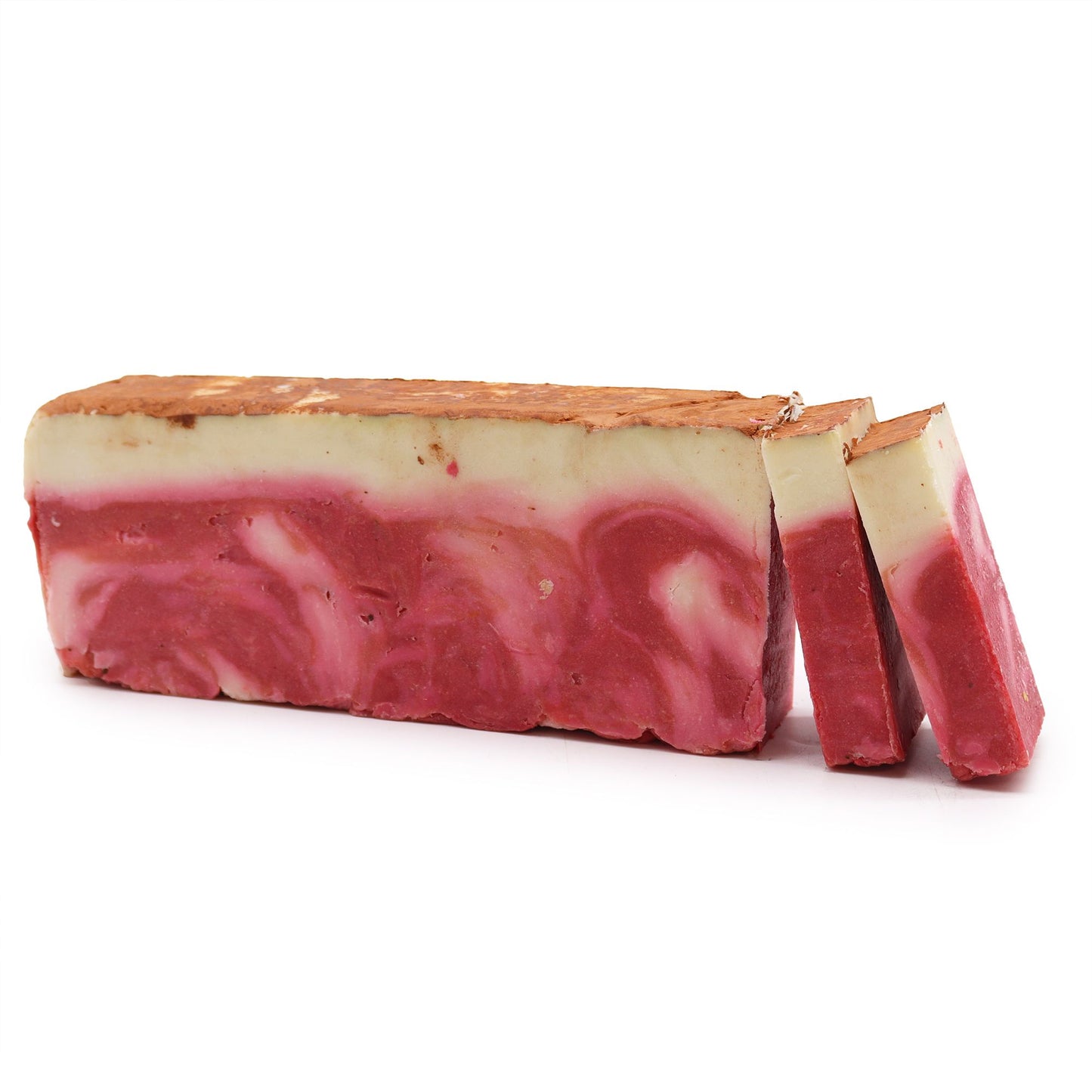 Handcrafted rustic soap loaf with a rich earthy red clay tone and smooth olive oil texture.