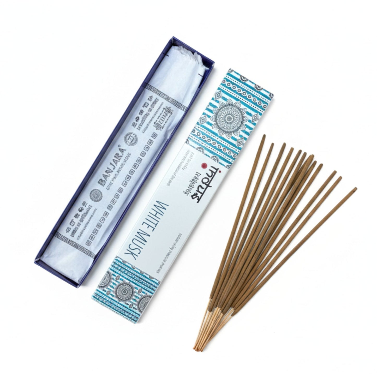 Hand-rolled incense sticks in a white musk fragrance, resting against a neutral background.