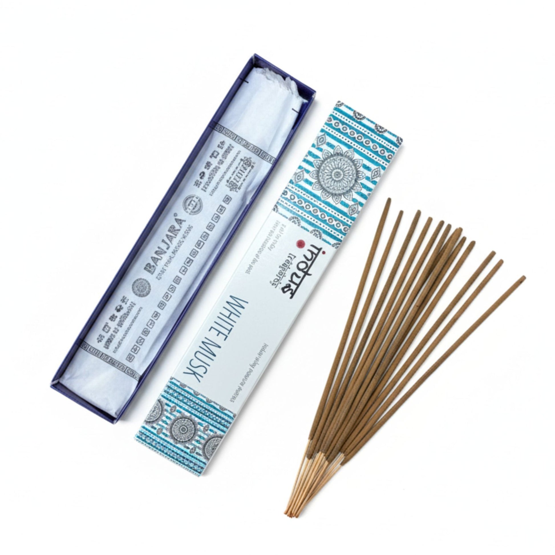 Hand-rolled incense sticks in a white musk fragrance, resting against a neutral background.