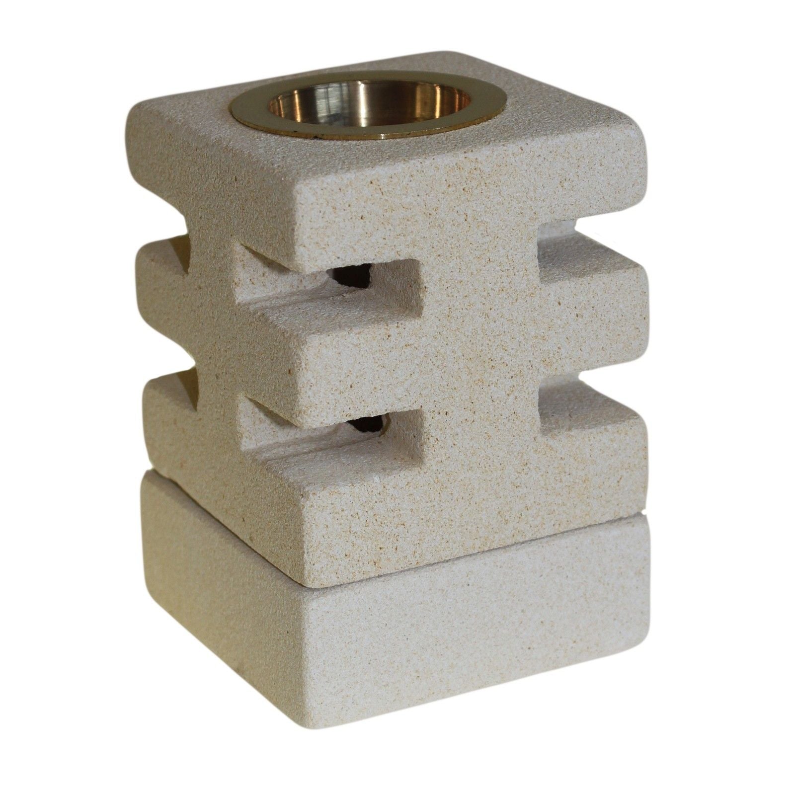 Hand-carved sandstone oil burner with abstract cut-out designs and a natural stone finish.