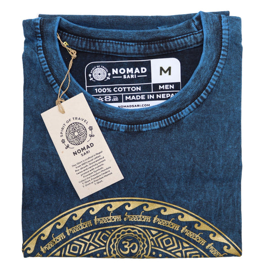 Close-up of a blue stone washed cotton t-shirt featuring a vertical seven chakra symbol design.