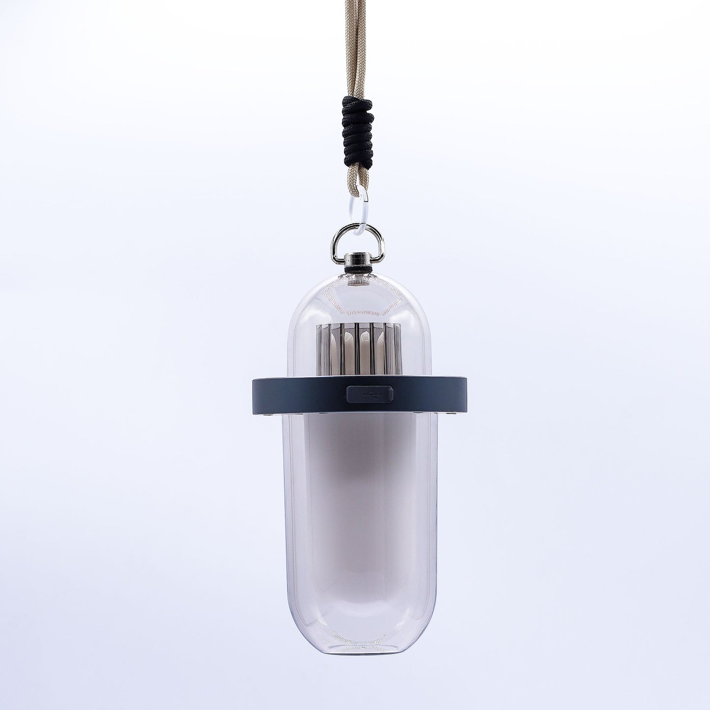 Sleek white portable outdoor lamp with a realistic flickering orange flame effect and minimalist cylindrical design.