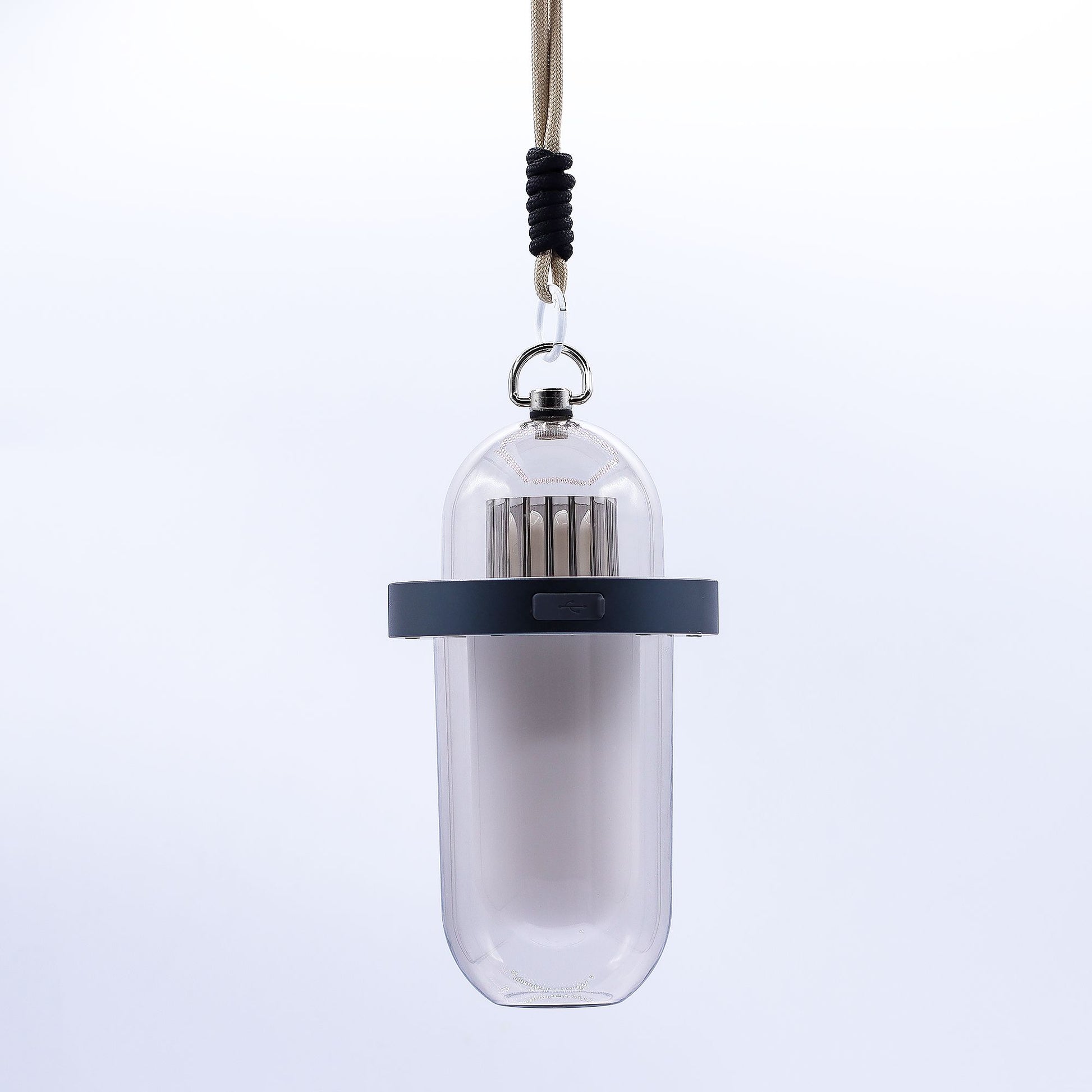 Sleek white portable outdoor lamp with a realistic flickering orange flame effect and minimalist cylindrical design.