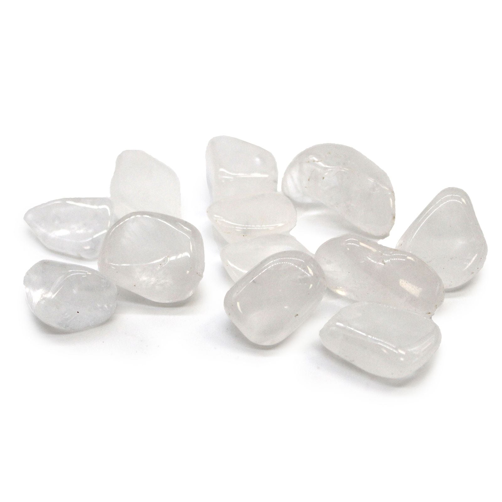 Highly polished clear and white Ice Quartz tumbled stones showing natural crystalline structures and smooth surfaces.