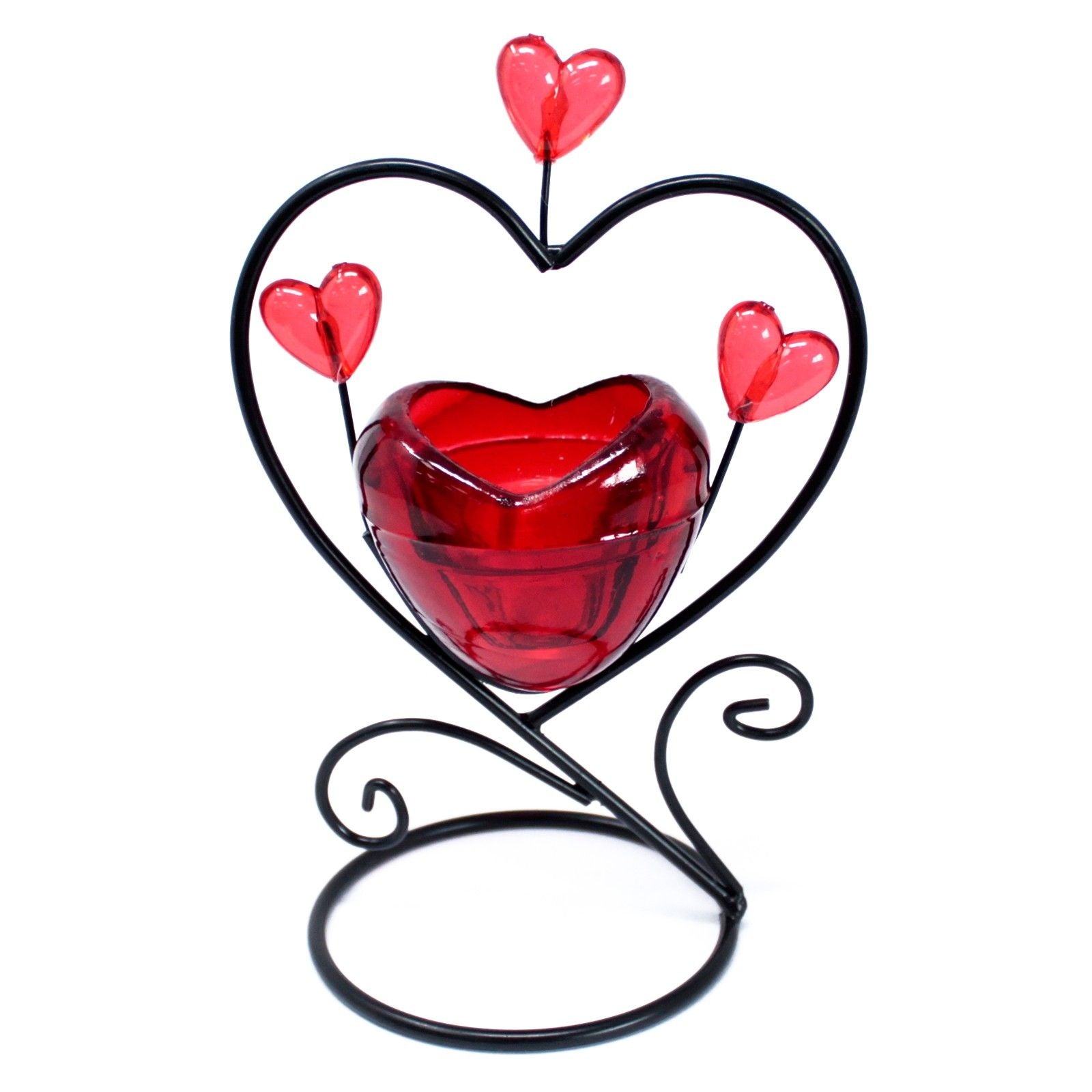 Elegant white ceramic candle holder featuring a small heart silhouette nested within a larger heart cutout.