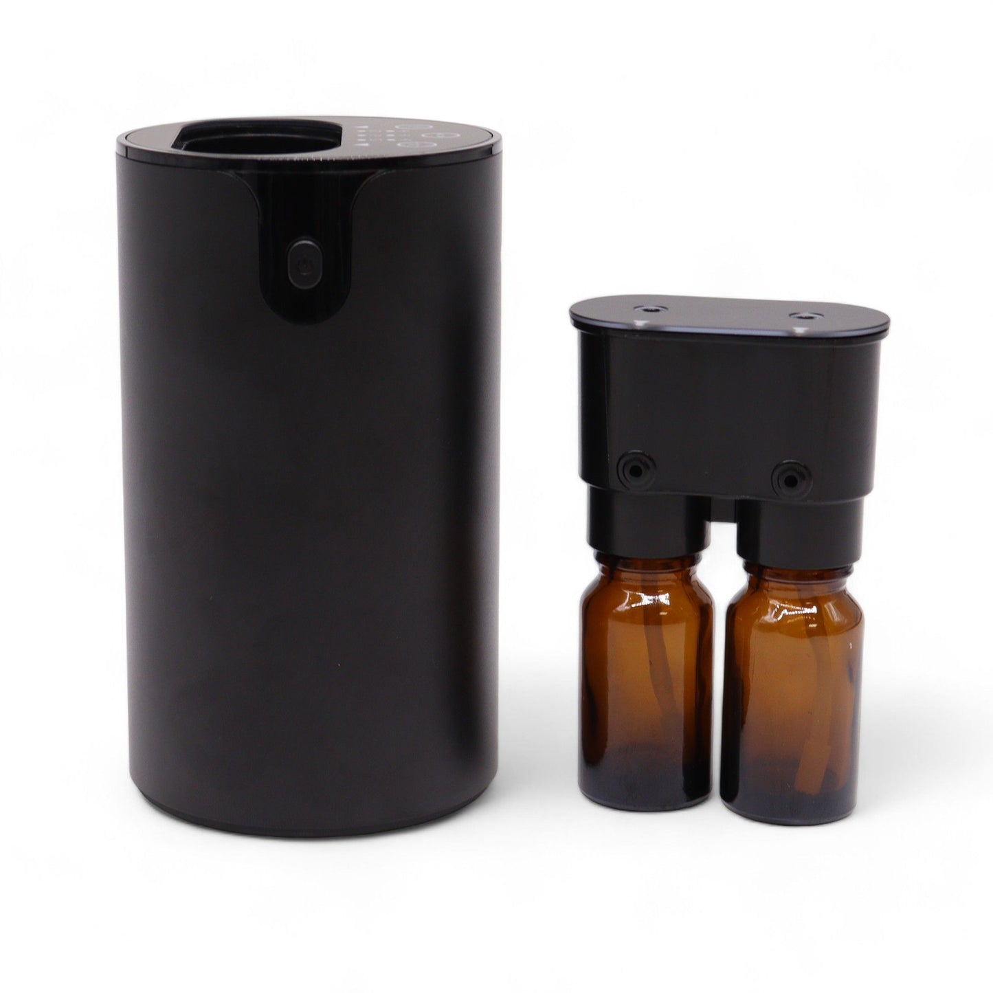 Sleek dual-nozzle waterless essential oil nebulizer in a compact cylindrical design with USB-C charging port.